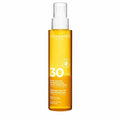 Clarins Glowing Sun Oil High Protection Body And Hair 150ml - By Mio Perfumería